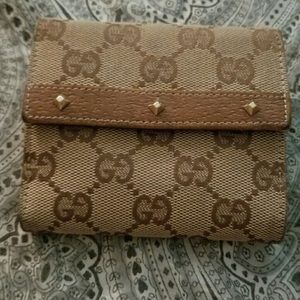 VERY RARE GUCCI MONOGRAM WALLET WITH STUDS.